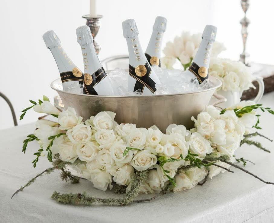 white rose with wine bucket